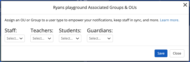 The Ryans playground Associated Groups and OUs window with four labeled dropdowns, Staff, Teachers, Students, and Guardians, each showing Select, above Save and Close buttons