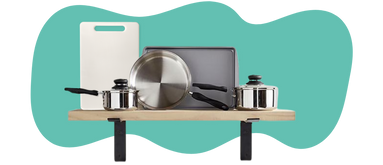 Basic cookingware displayed on a wall shelf