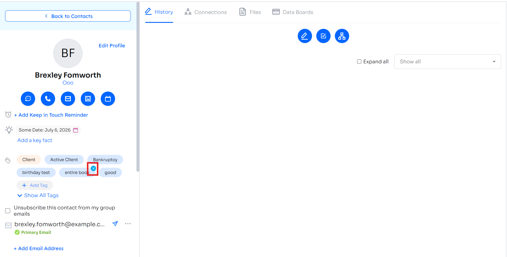 Contact profile page with the X button highlighted on a tag to remove it