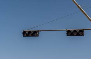 if a traffic signal light is not working, you must
