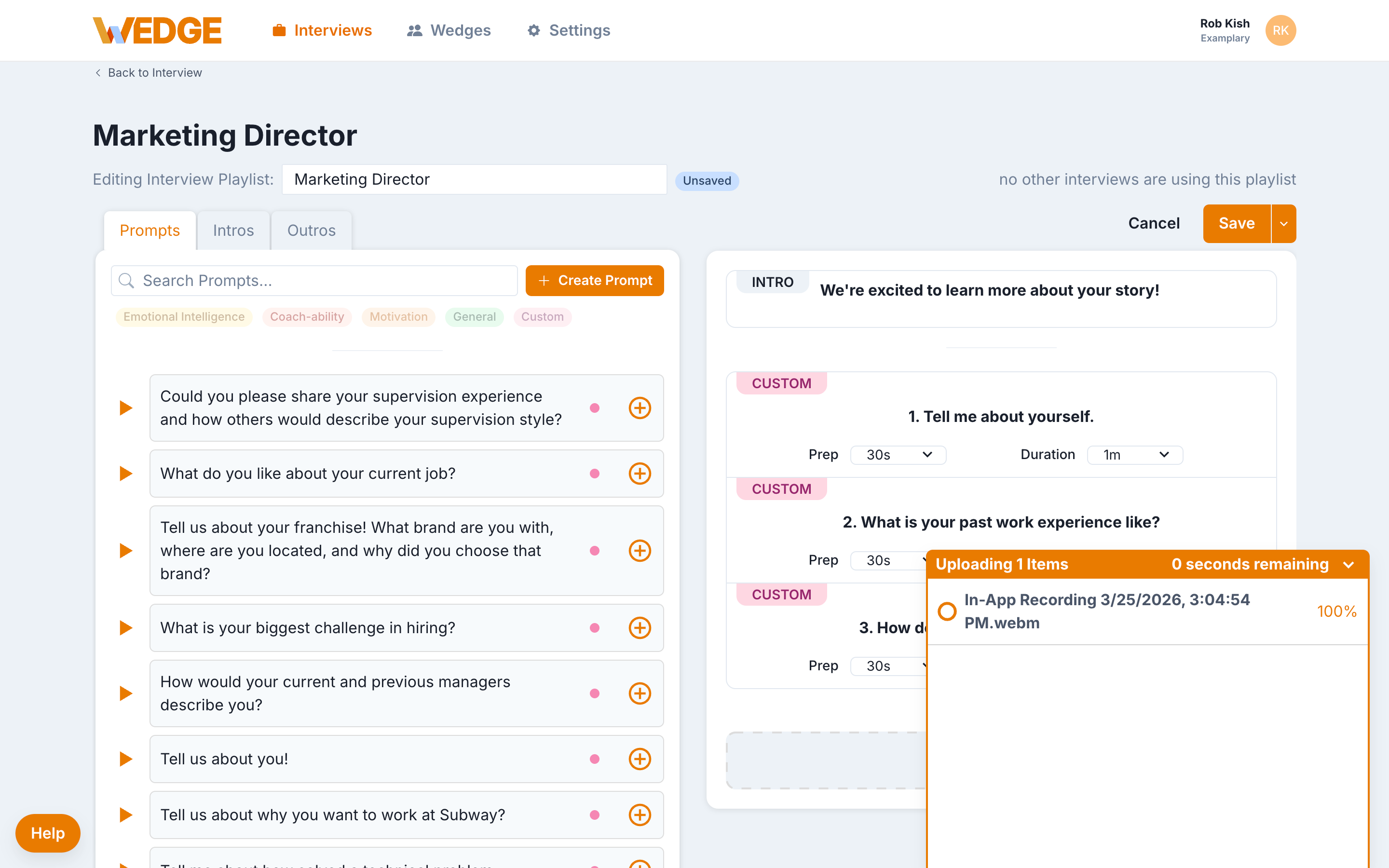 The WedgeHR upload progress indicator showing a video file uploading at 100 percent with zero seconds remaining.