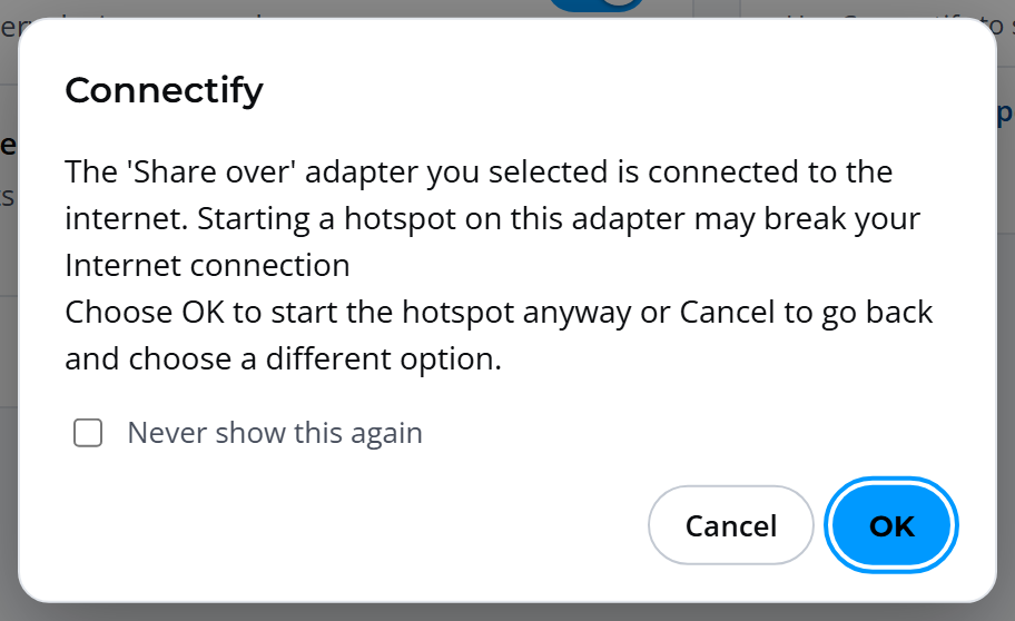 The question The 'Share over' adapter you selected is connected to the internet, with Never show this again, Cancel and OK