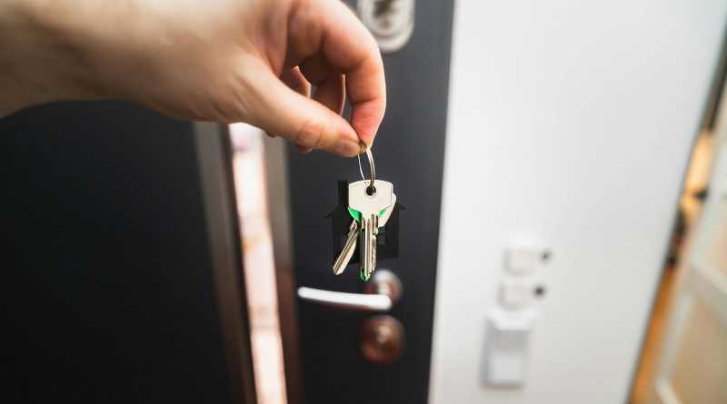 Close-up of someone holding a set of house keys.