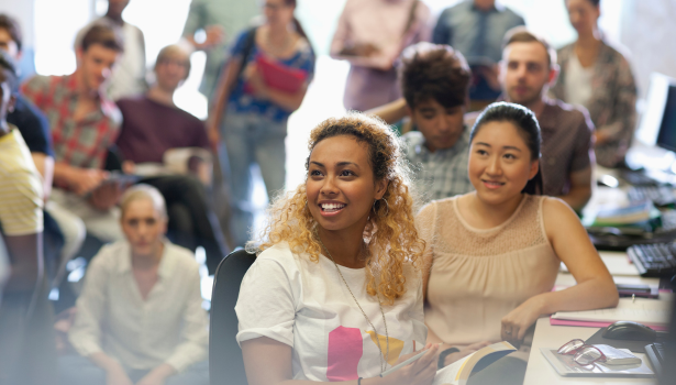 Group of students gathered in a room.