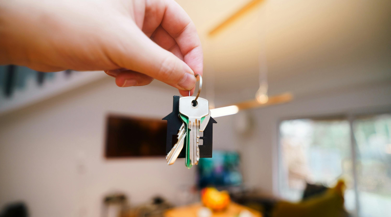Close-up of hand holding a set of keys