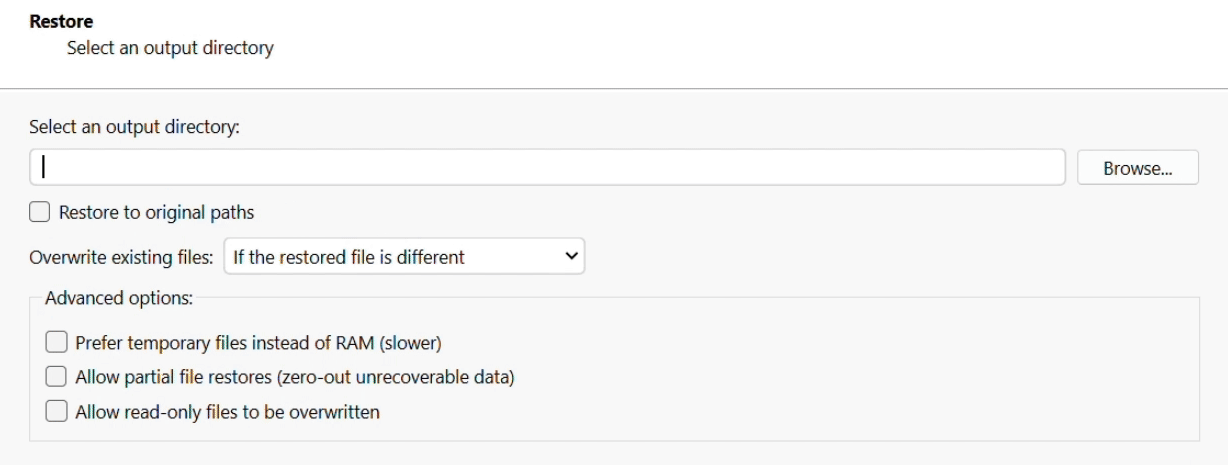 Restore destination screen with the output directory field, Restore to original paths checkbox, Overwrite existing files dropdown and advanced options