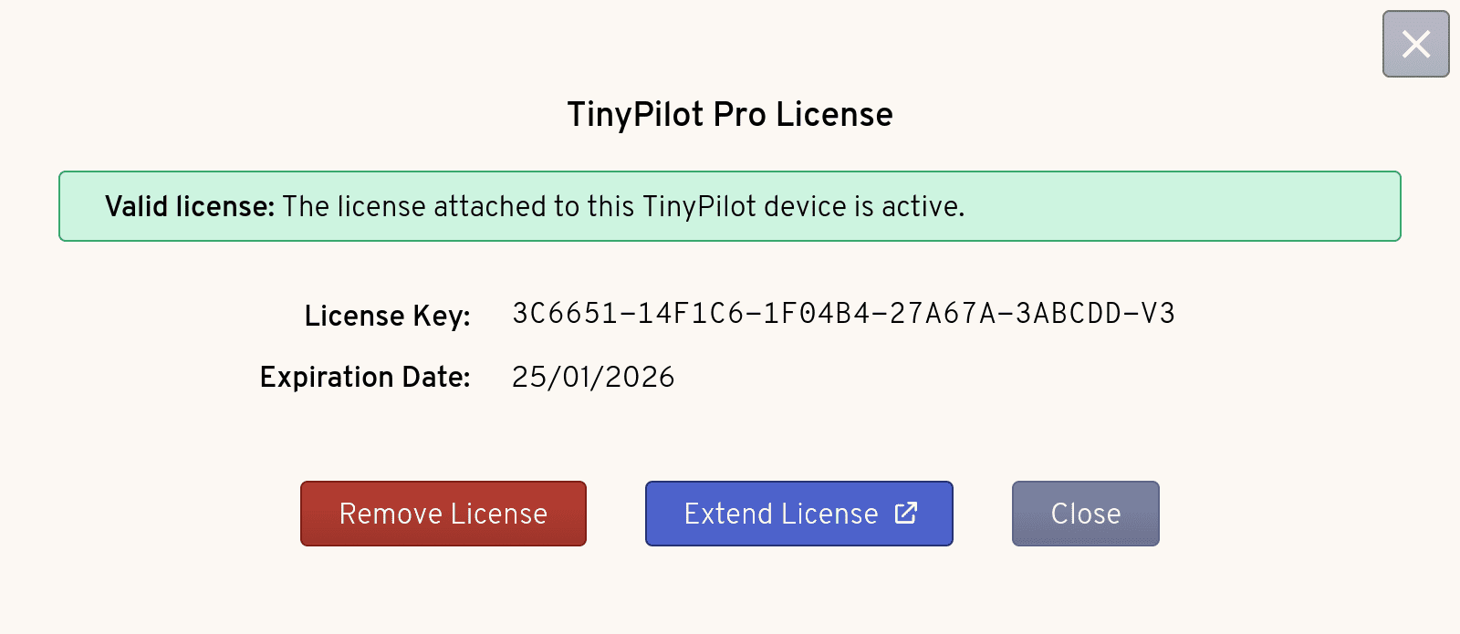 The TinyPilot License Dialog shows an active license with a future expiration date. There are buttons to remove and extend the license.