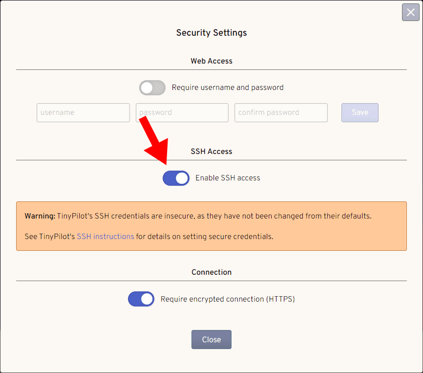 The TinyPilot 'Security Settings' dialog is shown. The 'Enable SSH access' toggle is in the on position.