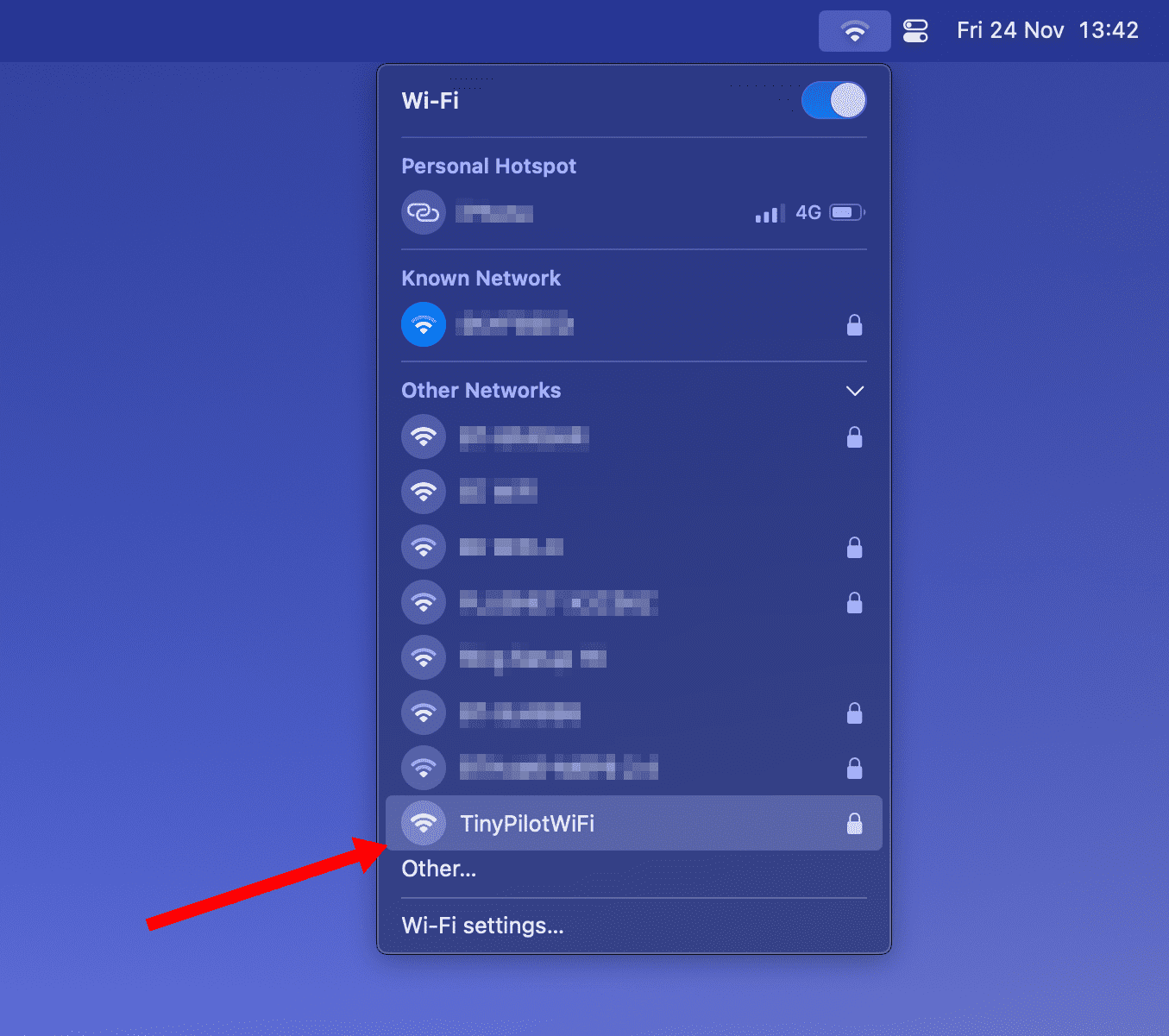 A Wi-Fi network list is open. In the 'other networks' section, 'TinyPilotWiFi' is highlighted as an avilable network. A red arrow points to the hightlighted network