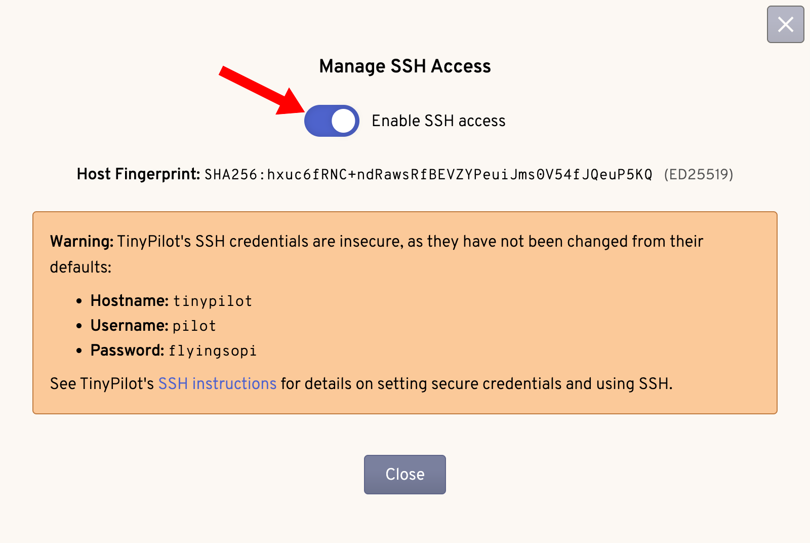 The TinyPilot 'SSH' dialog is shown. The 'Enable SSH access' toggle is in the on position.