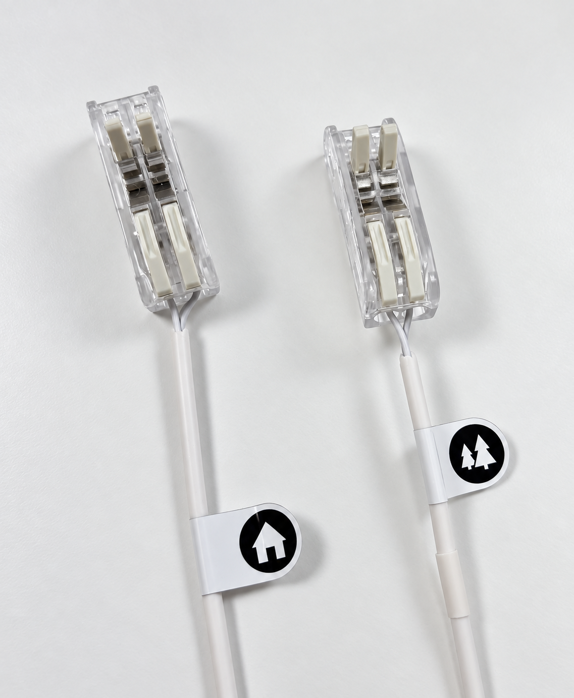 The two Y-cable connectors, with the house marking on the left and the tree marking on the right.
