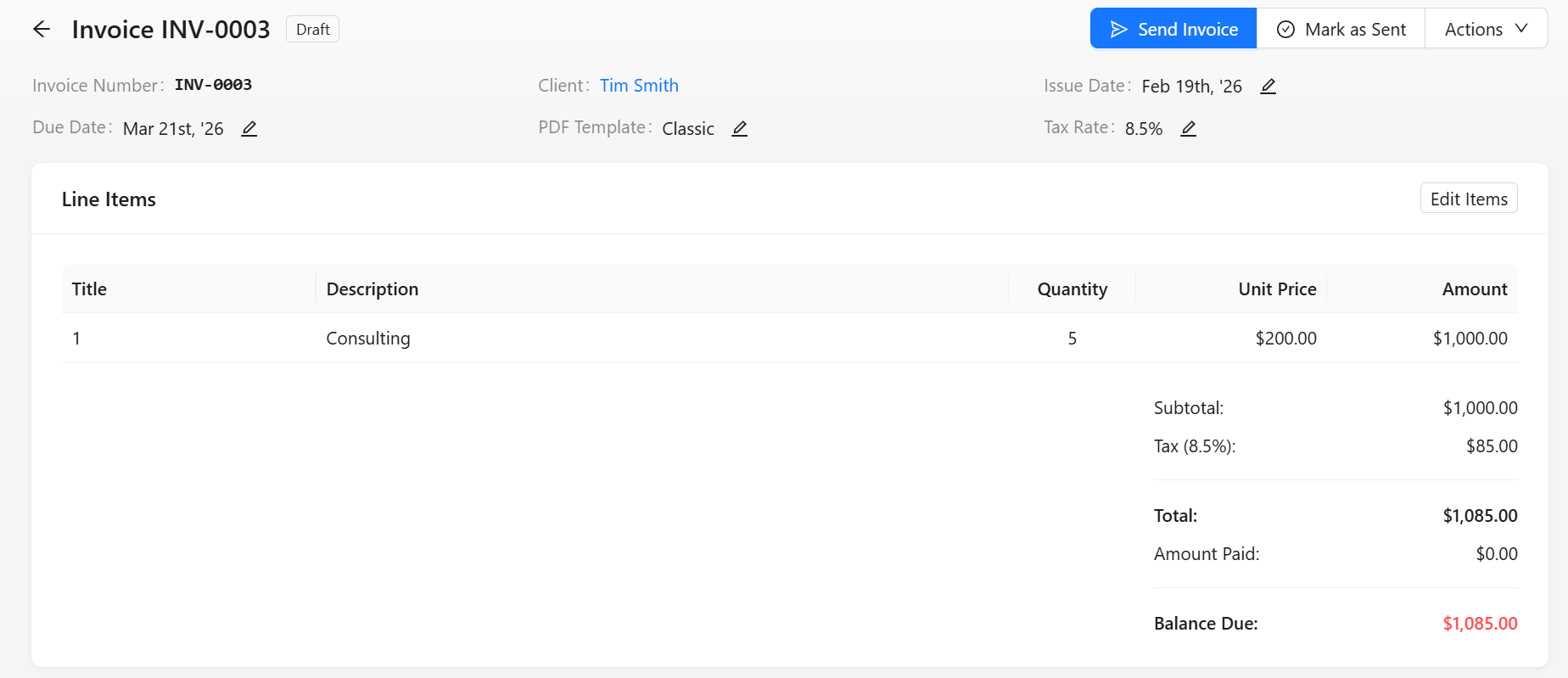 An invoice detail page in Draft status, showing line items, tax and balance due