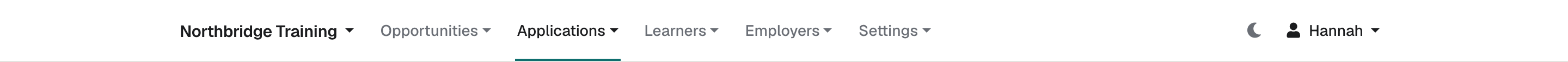 The enrola header: the organisation name on the left, then the Opportunities, Applications, Learners, Employers and Settings menus, and the dark mode button and user menu on the right.