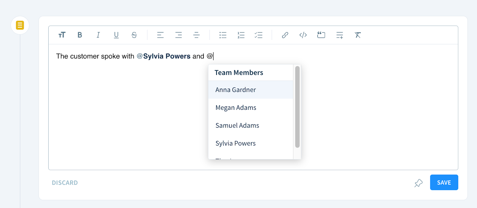 Screenshot of adding a mention to a note. Next to an @ sign inserted into the note body appears a drop-down with team member names.