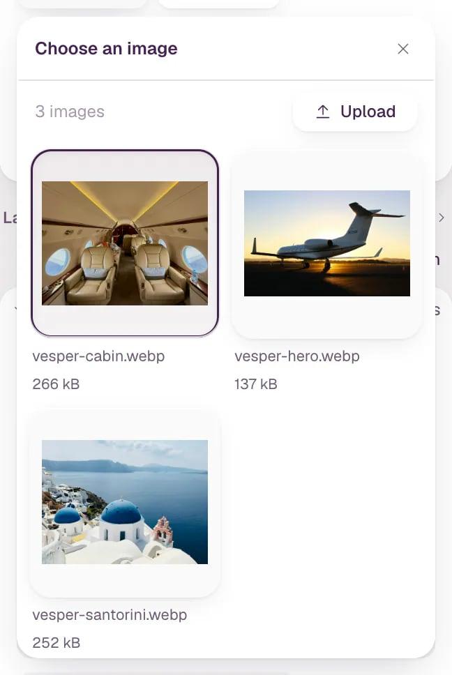 The Choose an image window with the site's images as thumbnails: a jet cabin, a jet at sunset and Santorini.