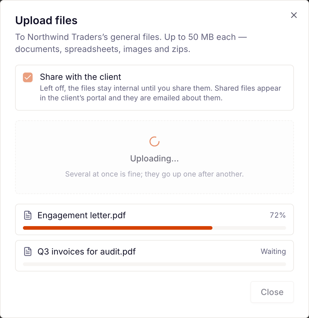 the Upload files dialog with Share with the client and two files uploading